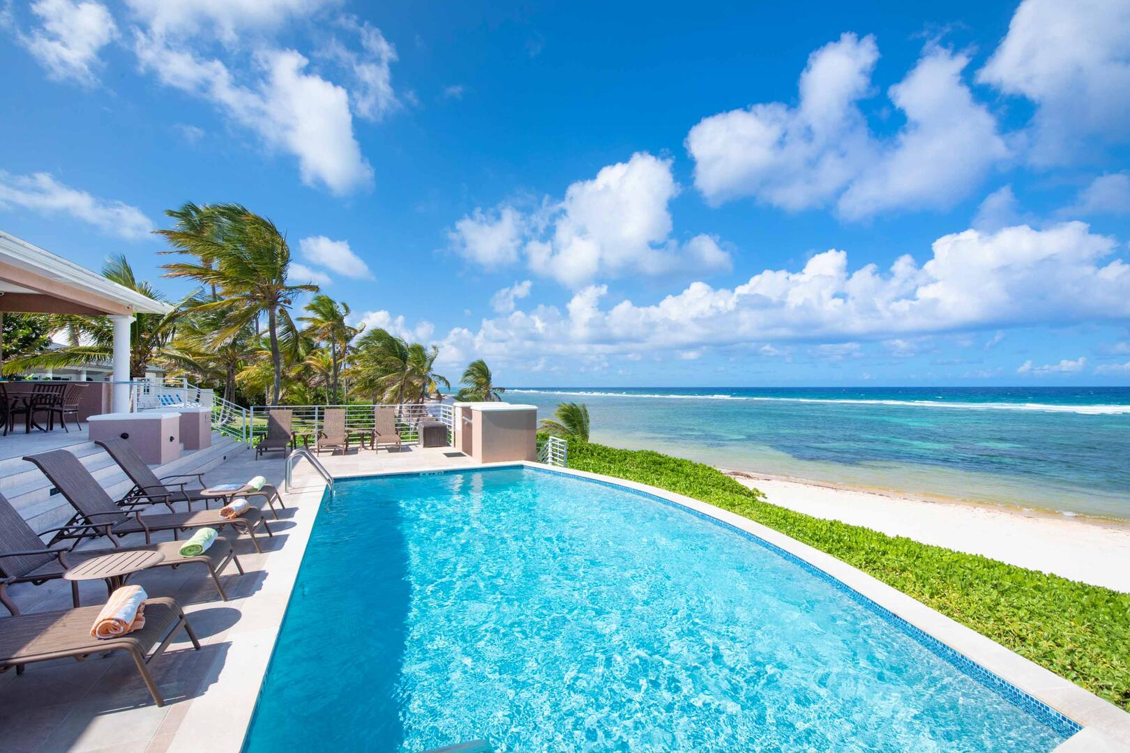 The large, oceanfront freshwater pool is elevated, allowing guests to soak in the wonderful ocean views while they swim.