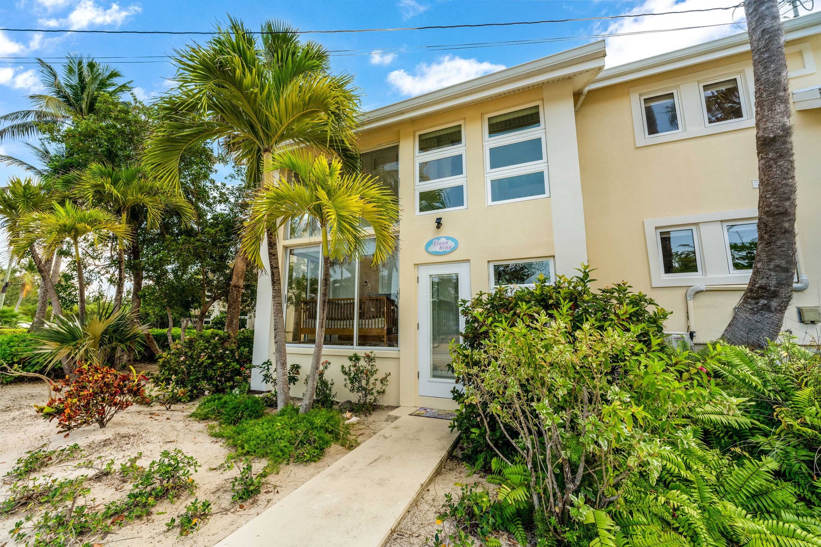 Front entrance with signage above the door.