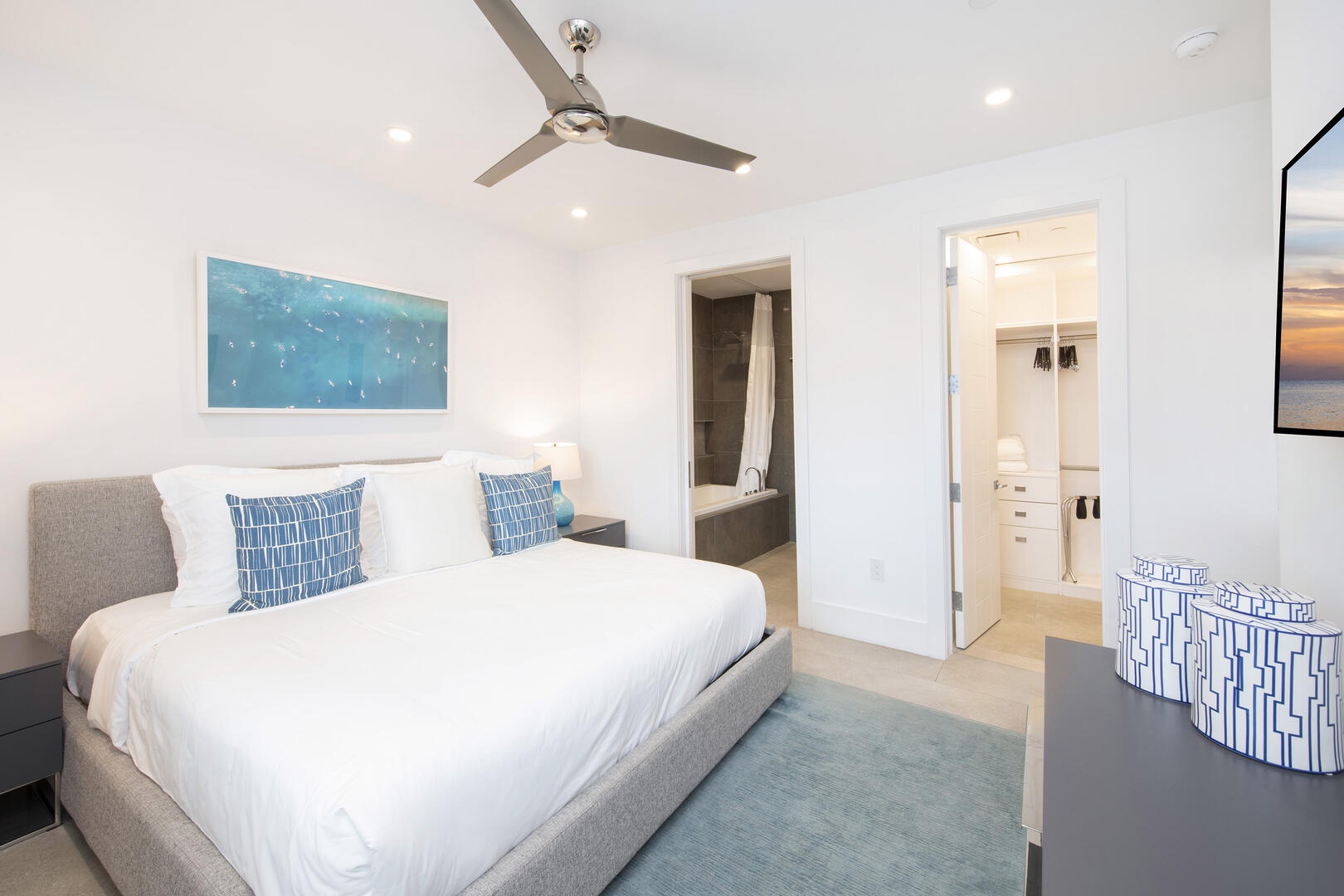 Guest suite #1 with walk-in closet and ensuite.