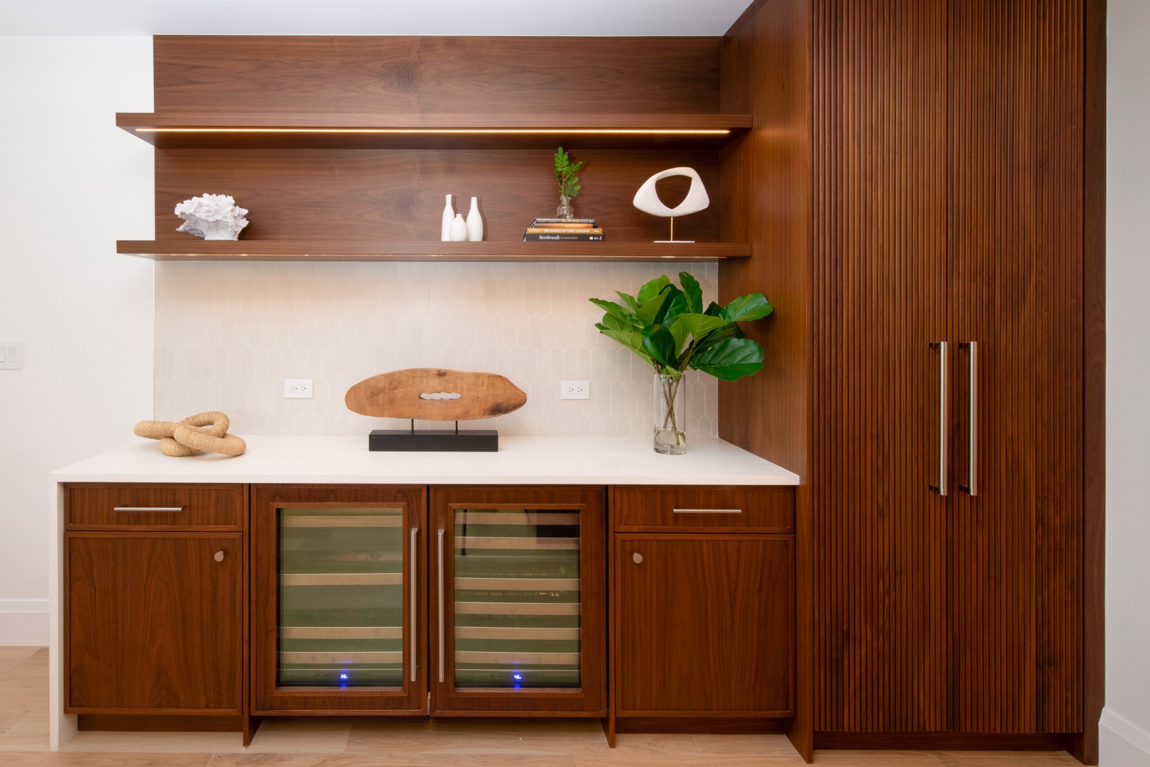 Stylish wine bar with mini-fridge.