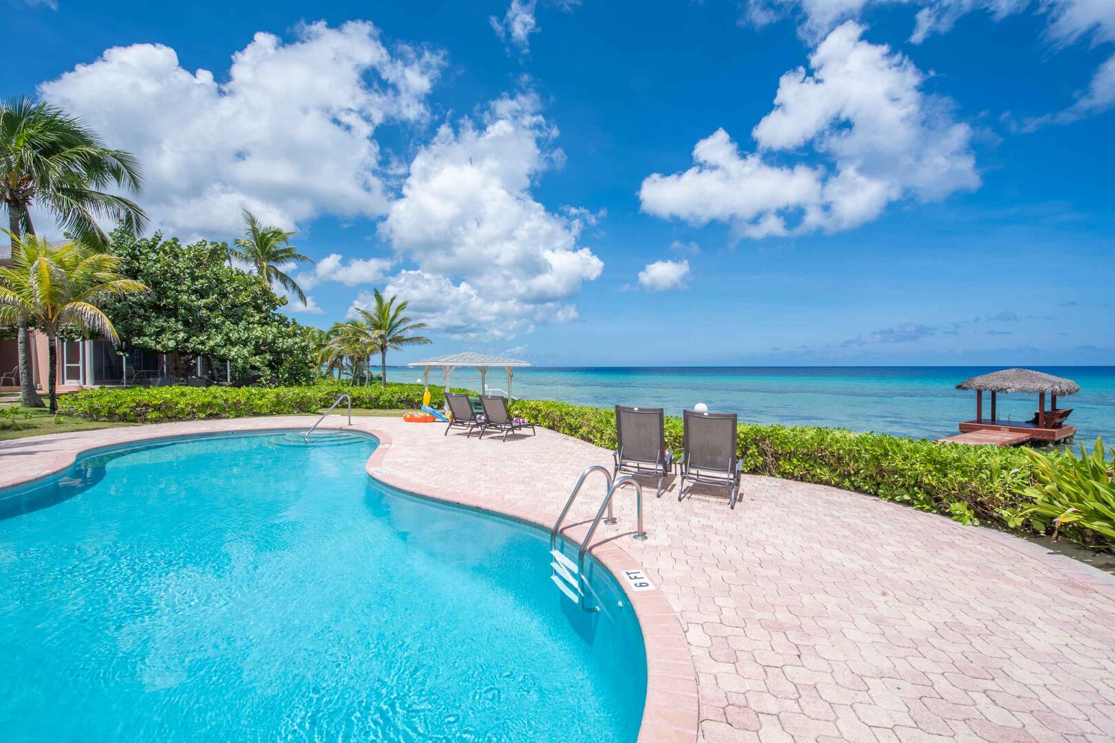 Community pool with picnic cabanas and amazing views.
