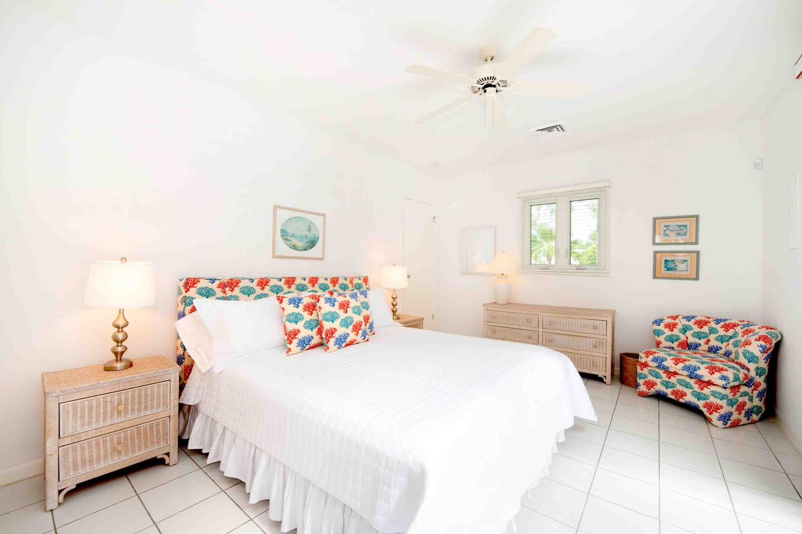 Bedroom 3 is furnished with a queen bed.