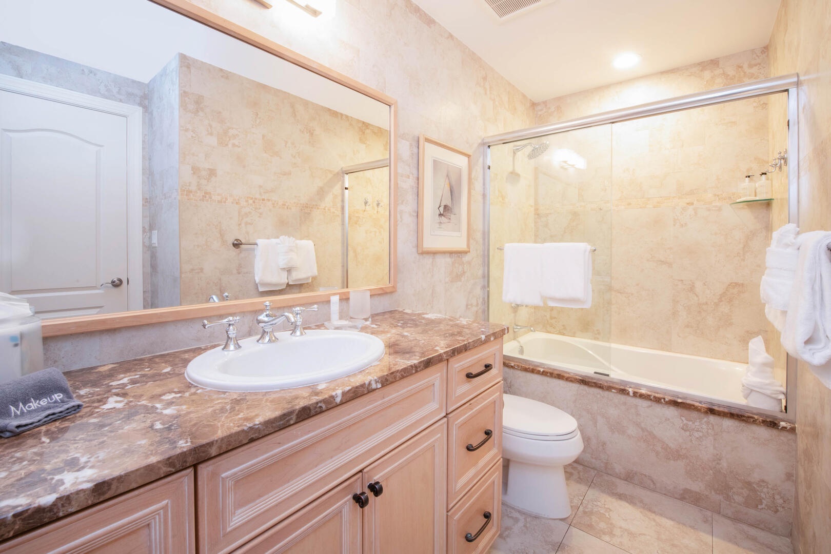 Guest ensuite with tub and shower.