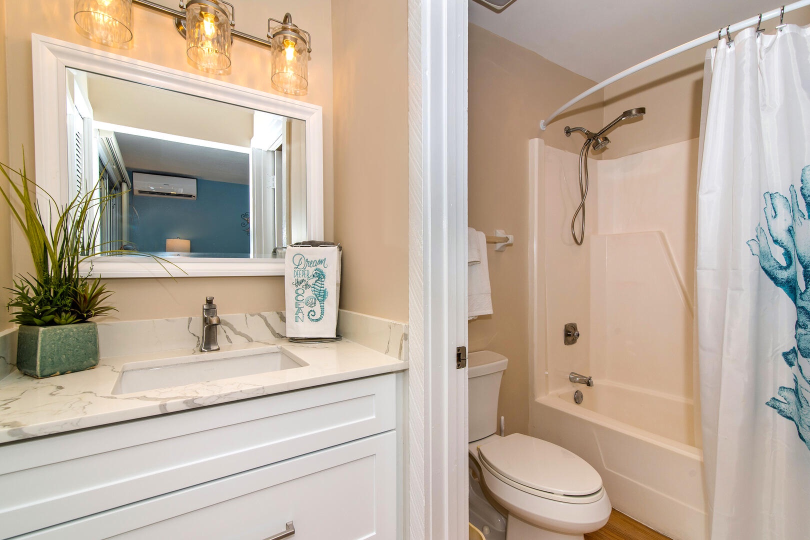 Bedroom 1 ensuite with shower bath.