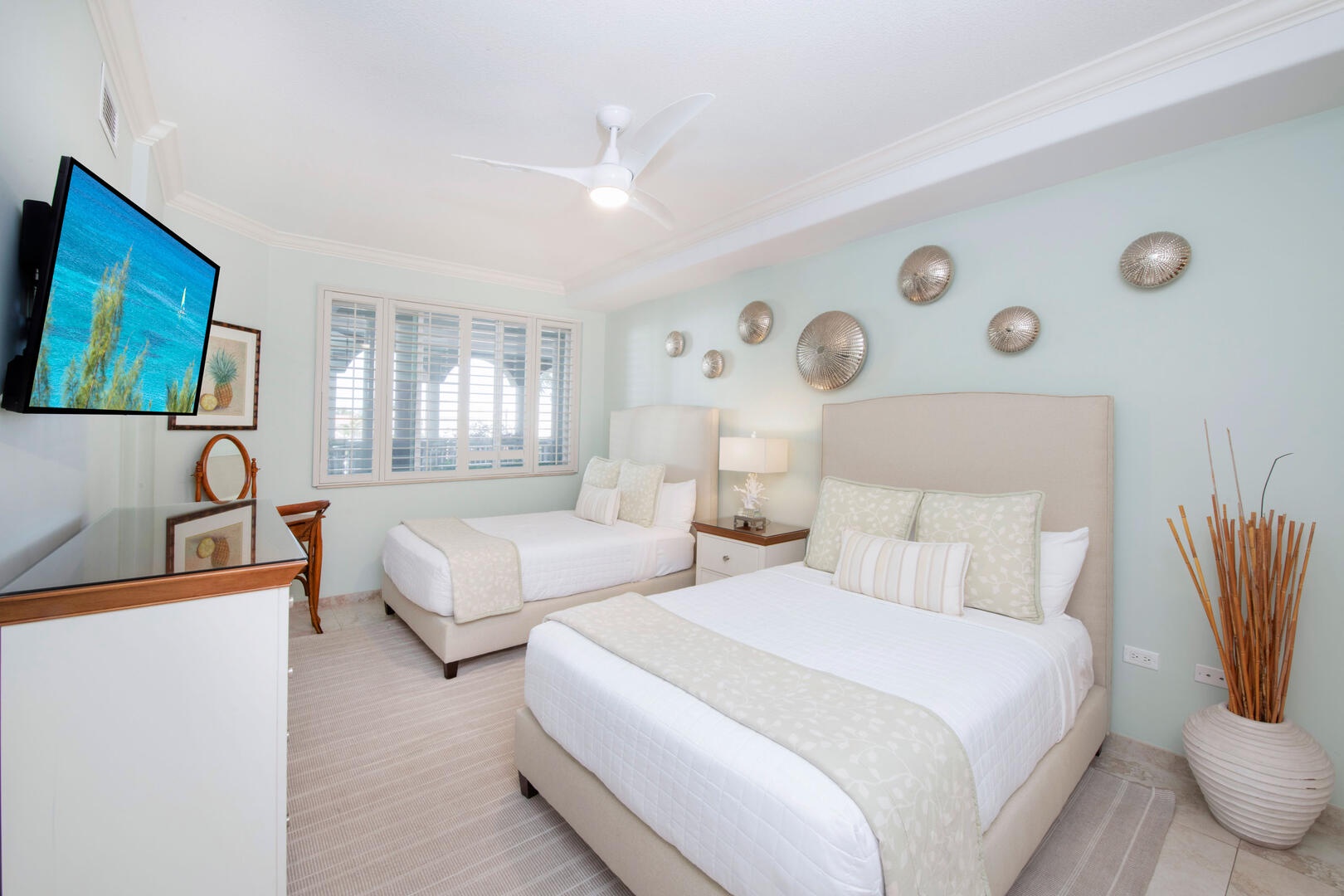 Guest suite with two double beds.