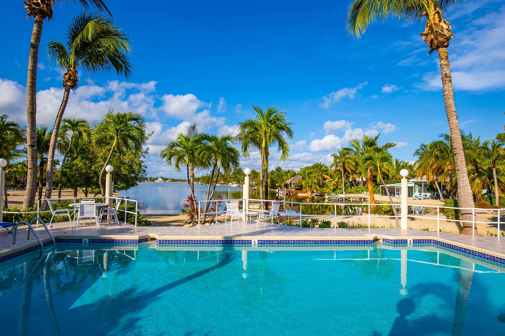 View of the community pool and Cayman Kai cove.