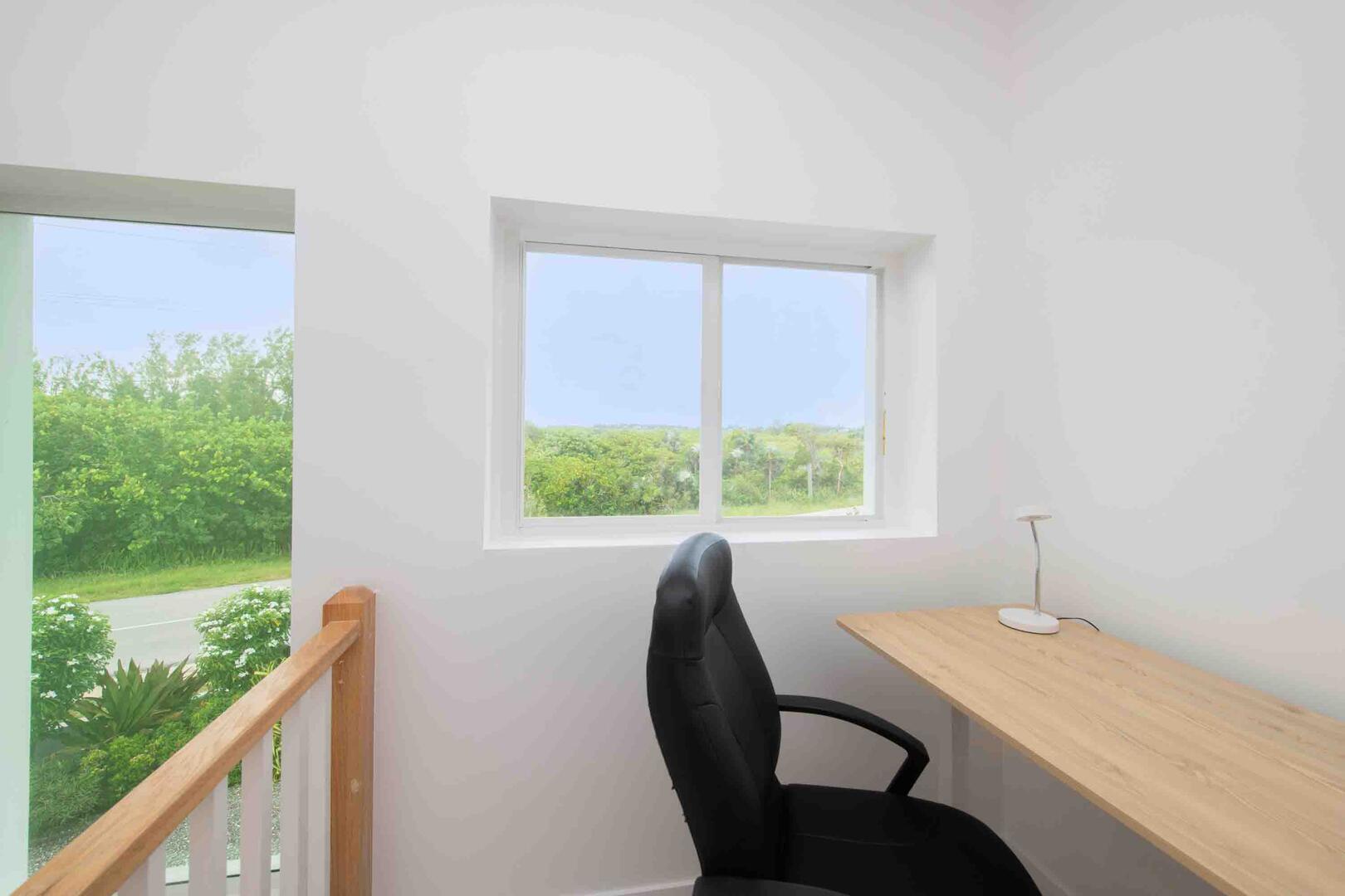 Desk + chair at the end of the upper landing is perfect for remote workers.
