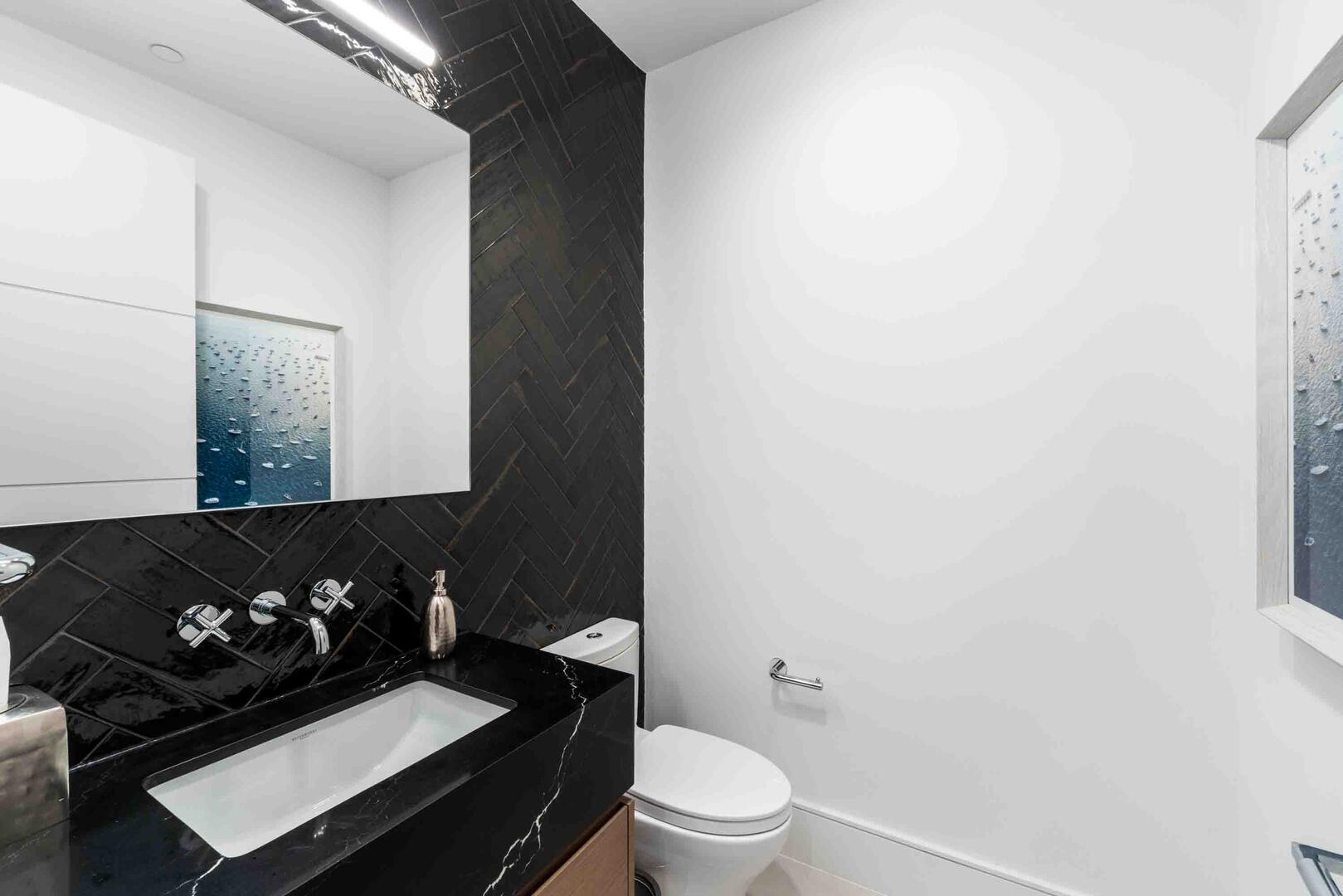 Powder room off the foyer.