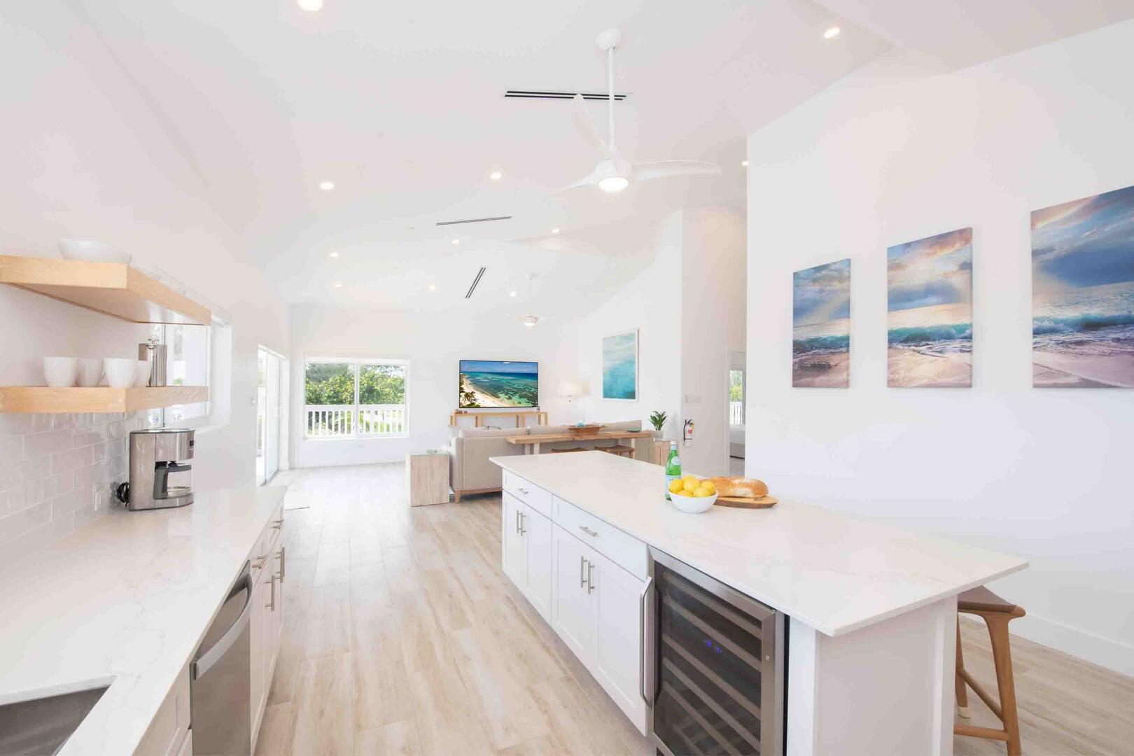 The kitchen comes equipped with a beverage fridge and a drip coffee machine.