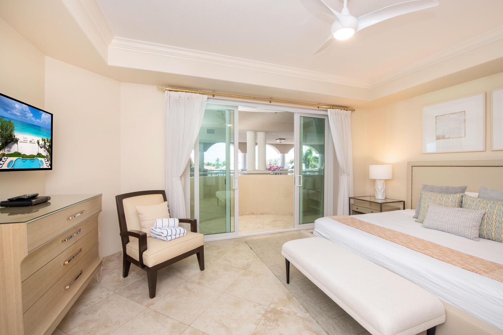 Primary suite with king bed and cable HD TV.