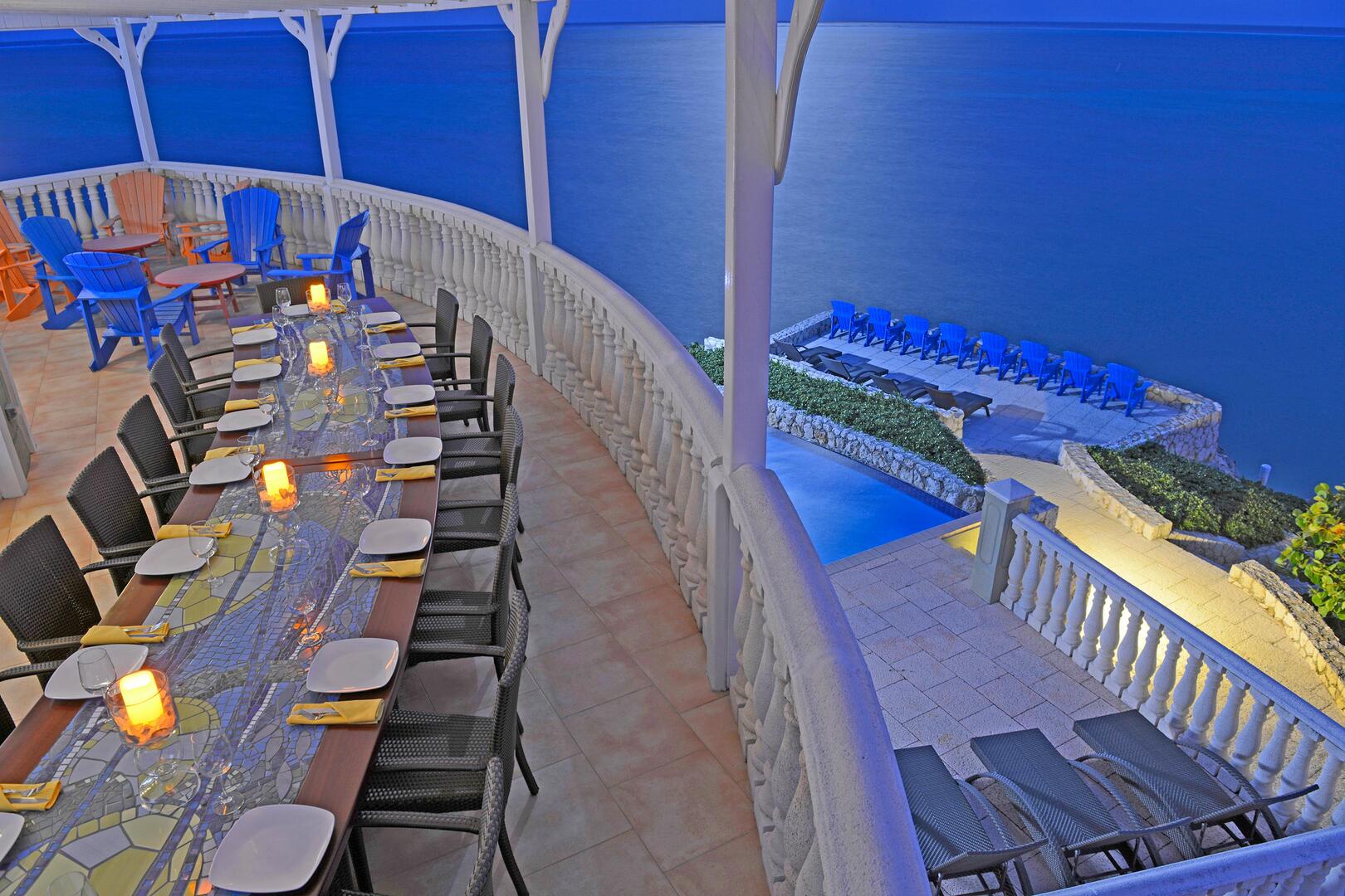 Large family dining table on the balcony off the great room.