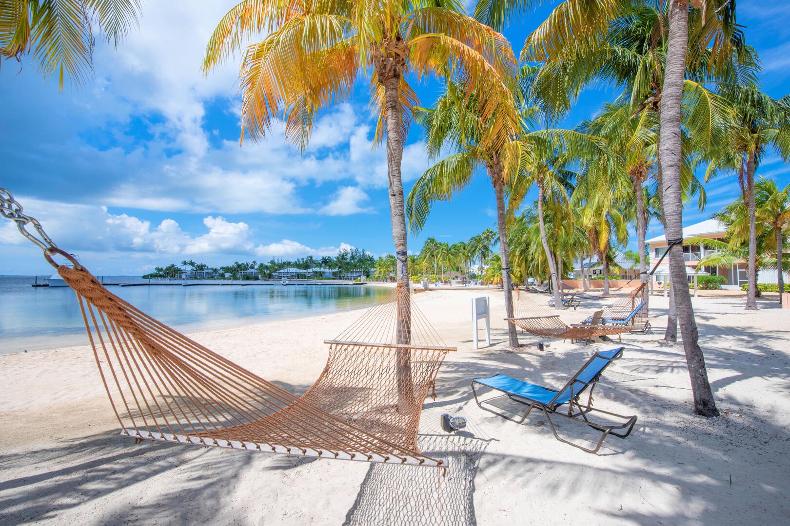 Slide into one of the beachside hammocks for a siesta by the sea.