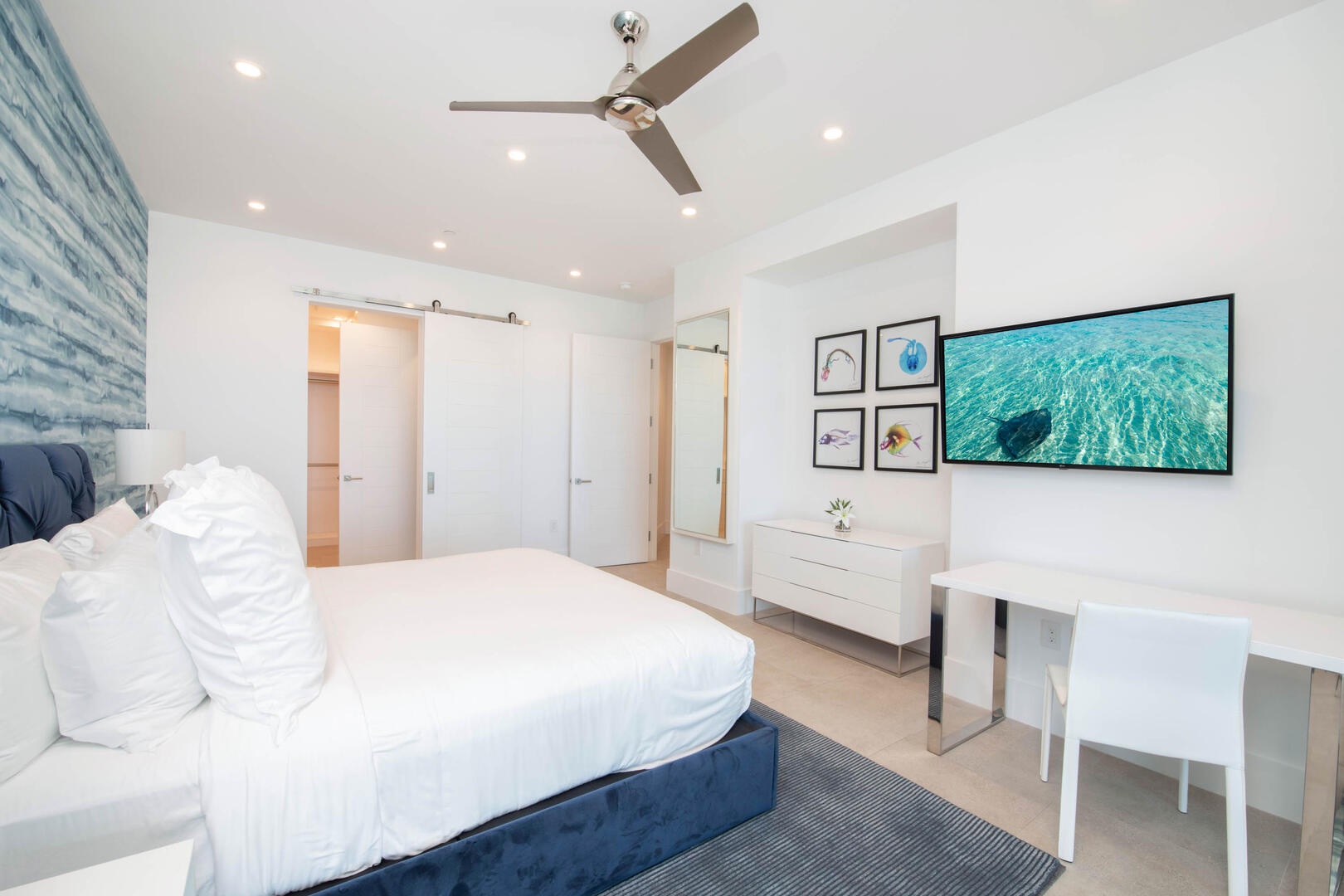 The Primary Suite is also furnished with a desk and chair, perfect for work-from-home professionals.