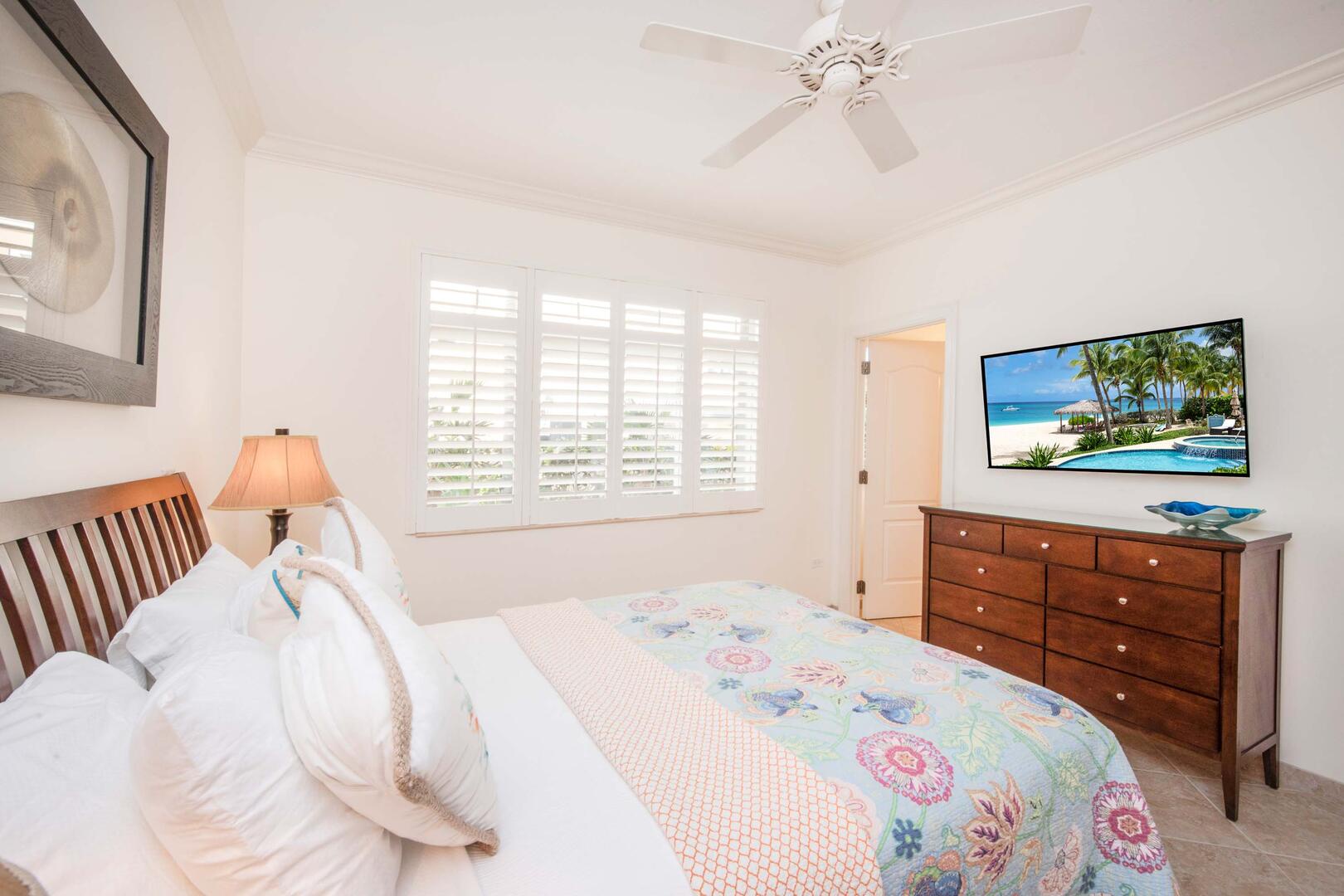 Bedroom 2 with queen bed and HD cable TV.
