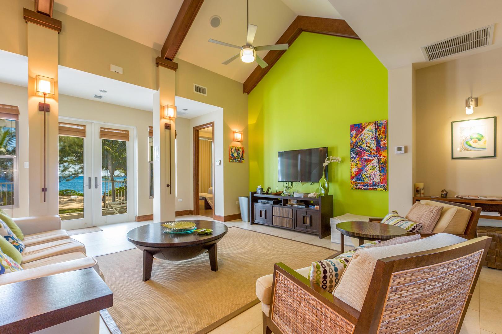 Avocado Cottage's living room with a flat screen TV.