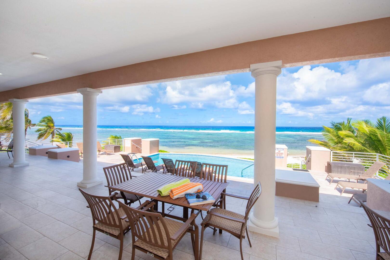 Dine al fresco at the outdoor table with beautiful blue views.