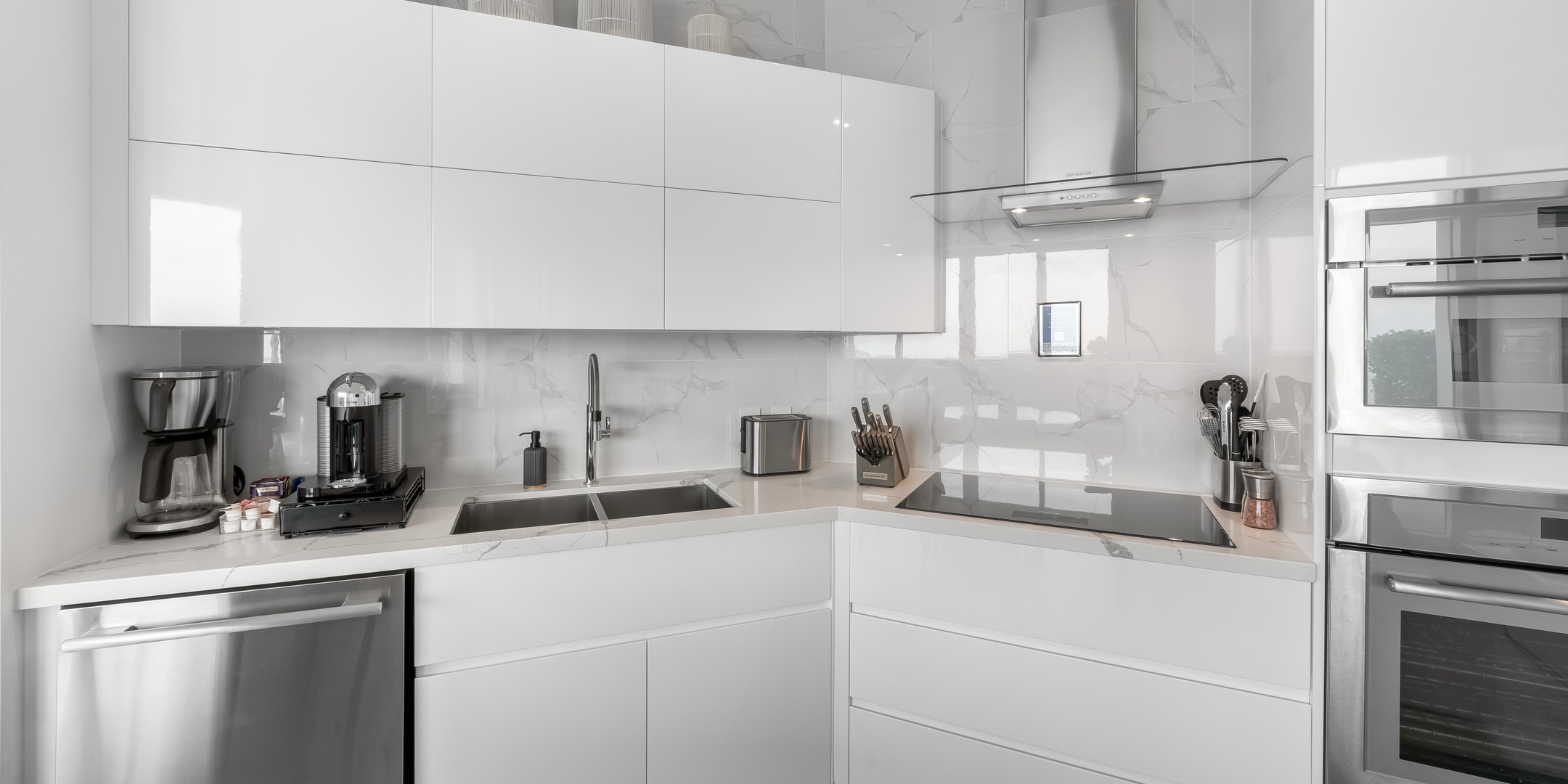 Kitchens come stocked with cookware, dishware, glassware, and cutlery.