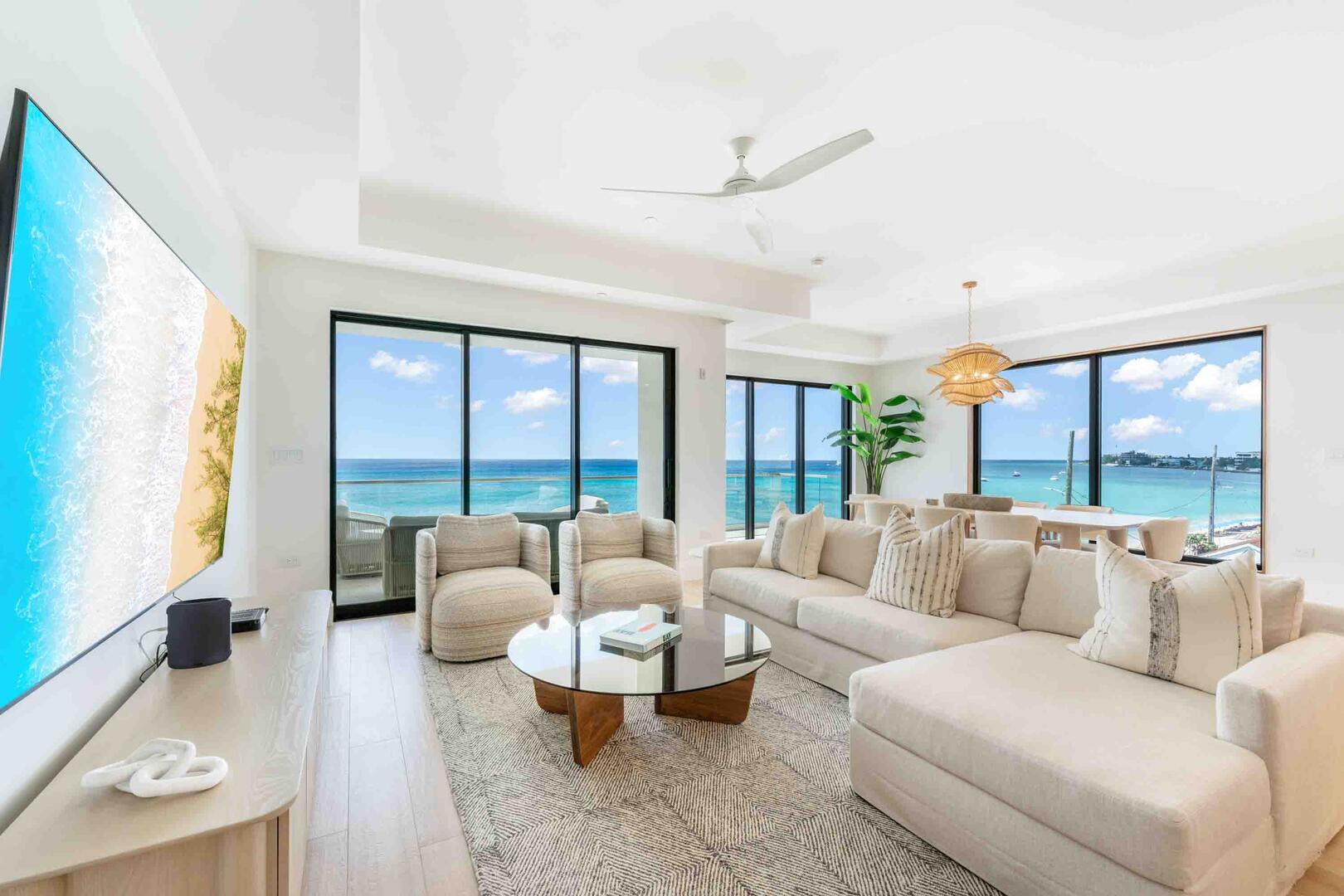 Welcome to The Sands 5, a newly built 4-bedroom, 4-bath luxe condo overlooking Seven Mile Beach.