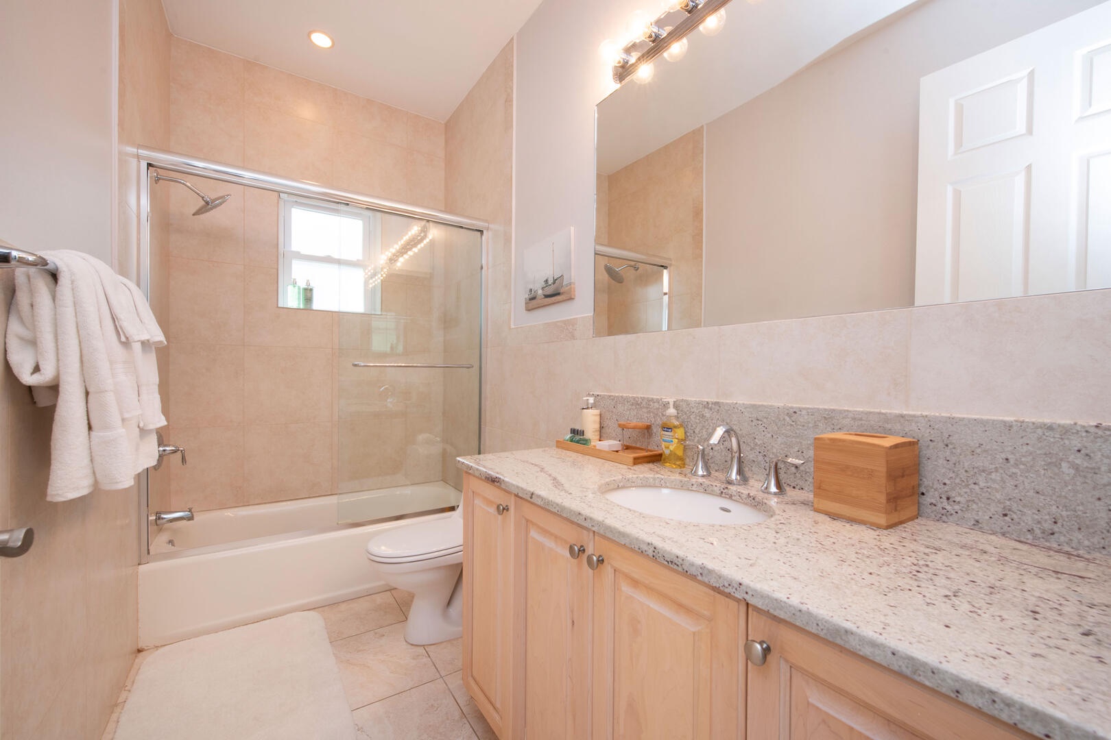 Shared Bathroom with shower and tub.
