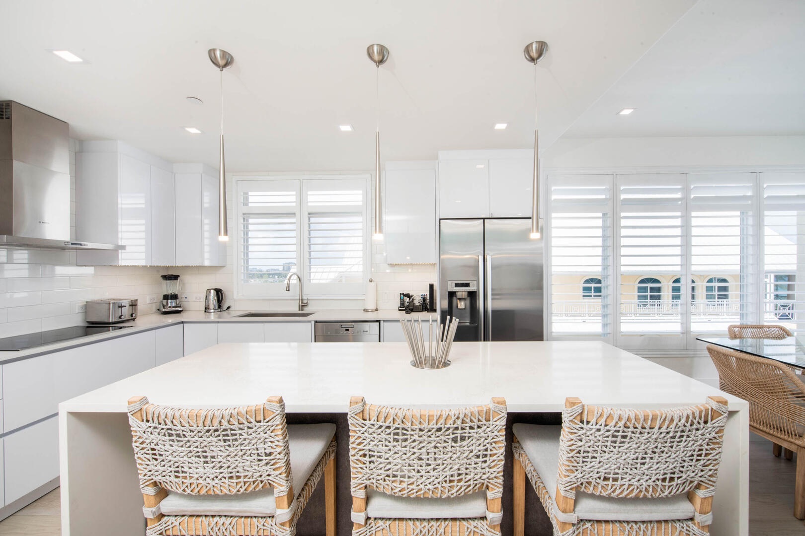 Kitchen island with breakfast bar seating for 3.