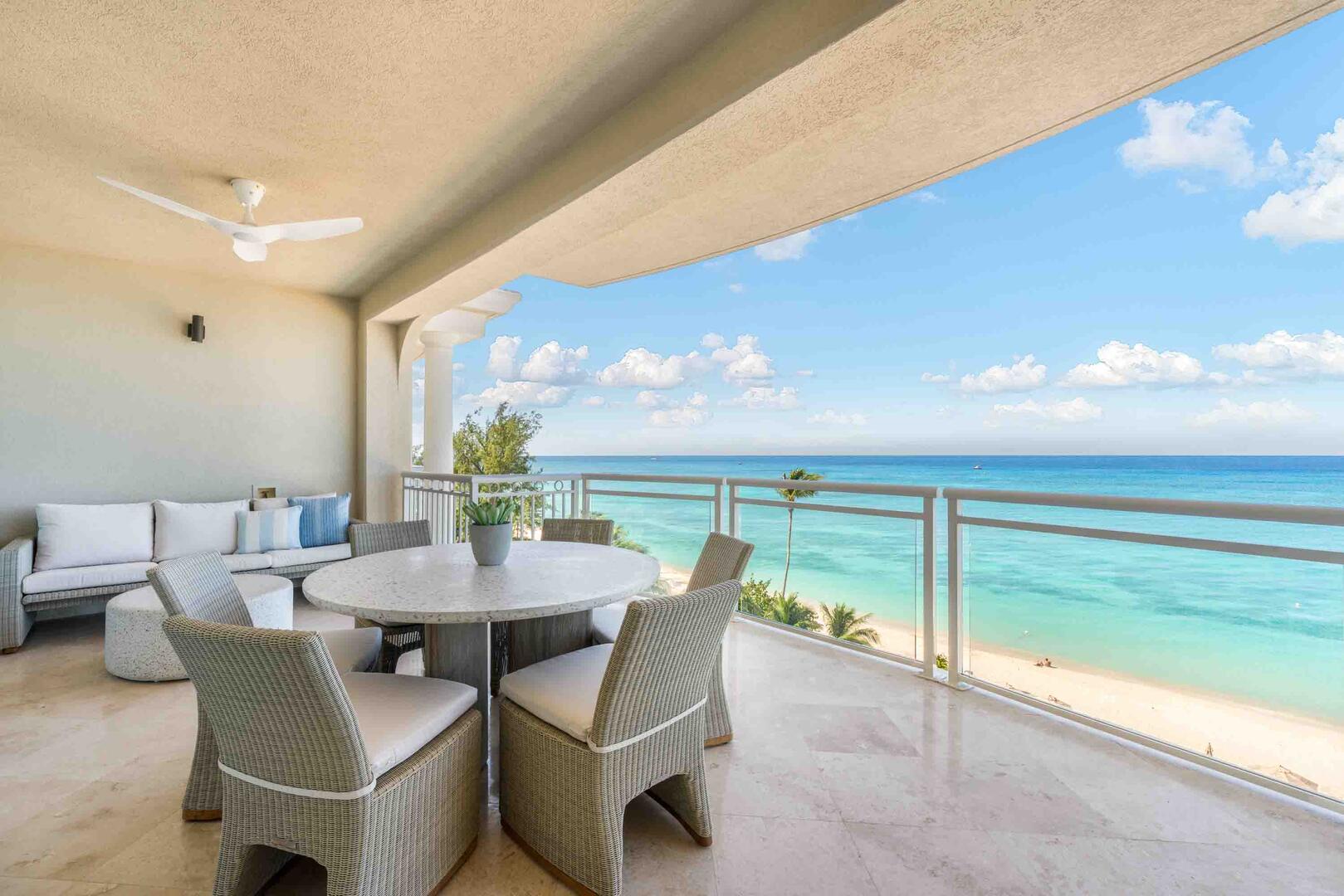 Private furnished balcony overlooking Seven Mile Beach.