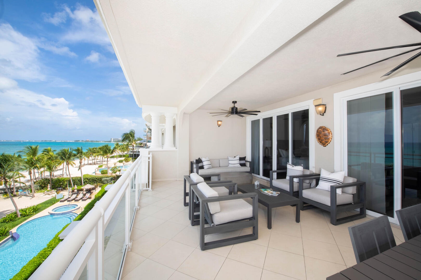 Furnished balcony with oceanfront views.