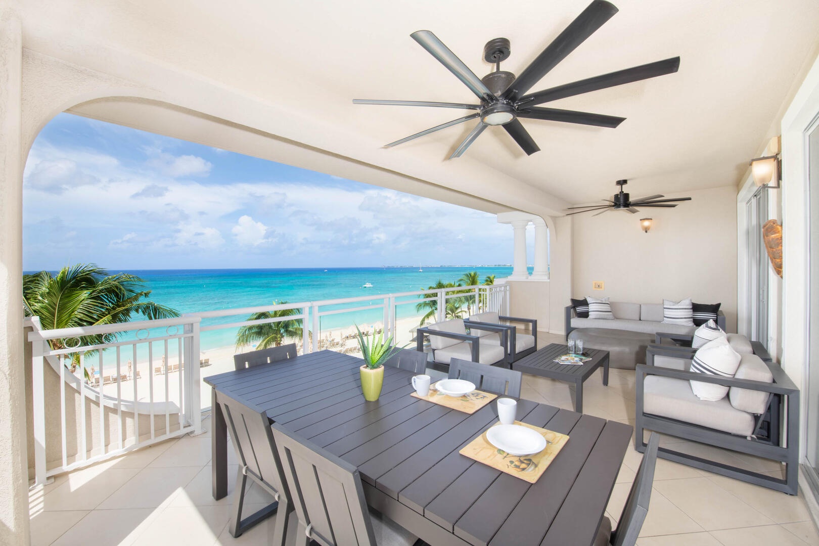 Furnished balcony with oceanfront views.
