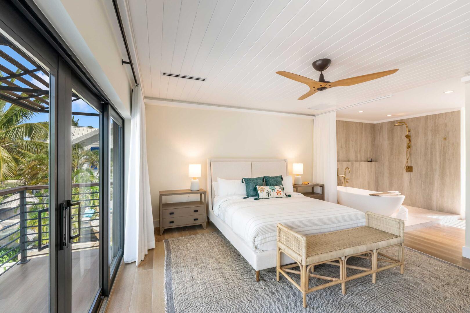 Bedroom 2 on the upper level with king bed and open ensuite.