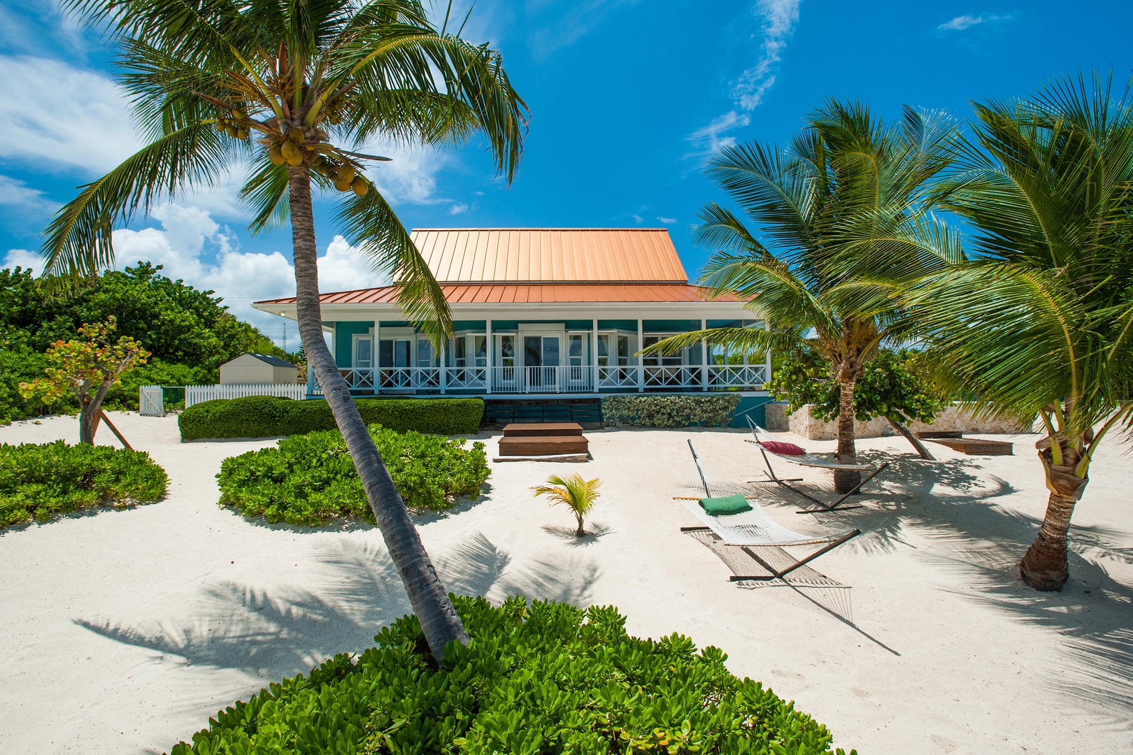Sandy beachfront with hammocks for afternoon siestas.