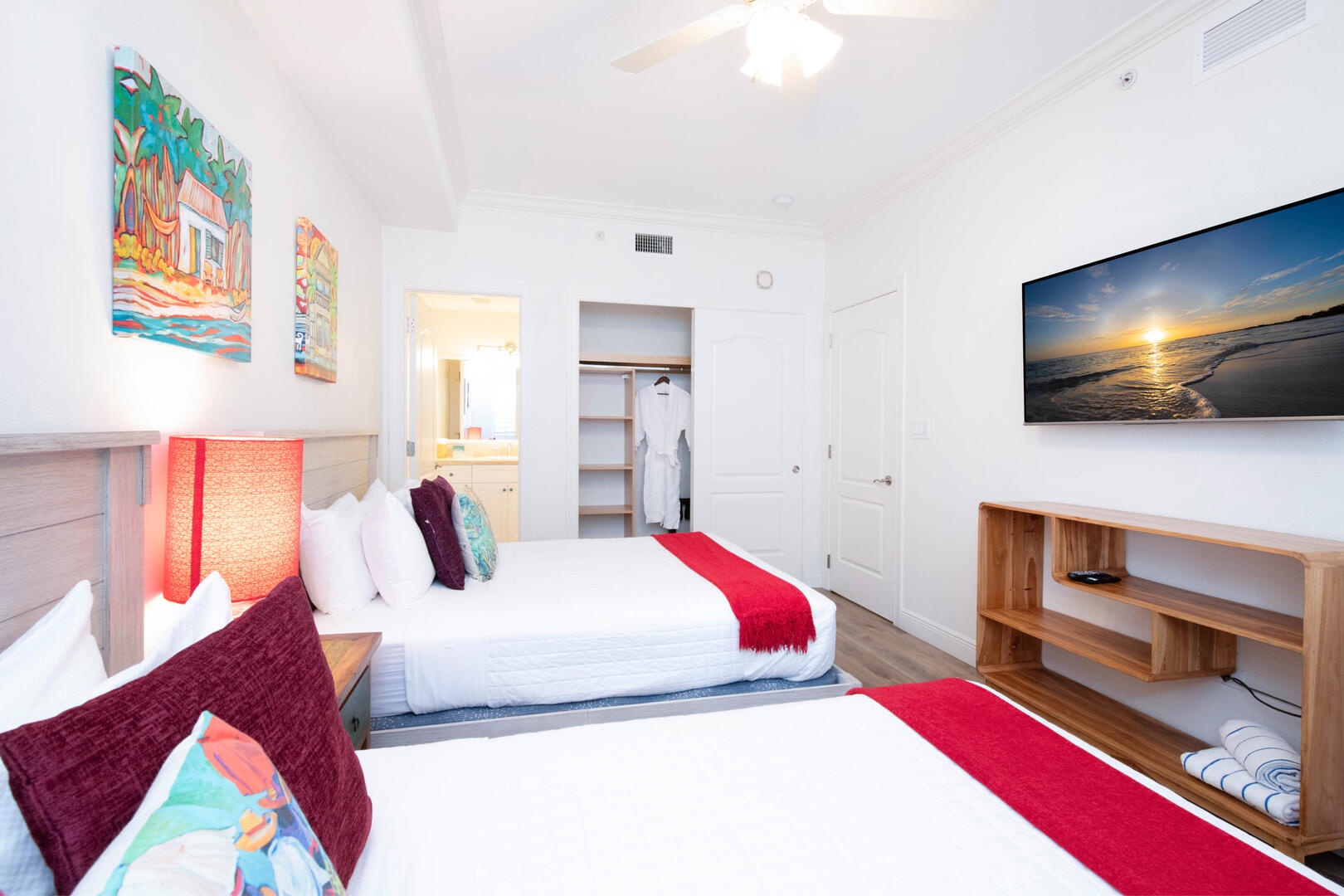 Guest Suite #2 furnished with two queen beds and a television.