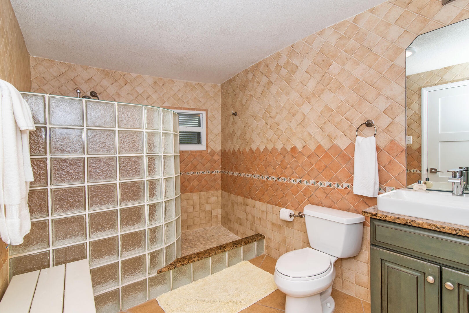 Queen suite bathroom with shower.
