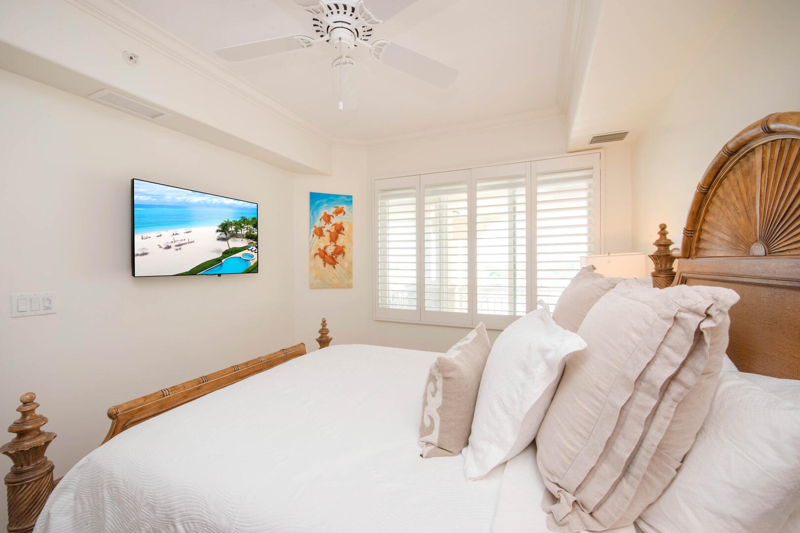 Bedroom 2 with queen bed and cable HD TV.