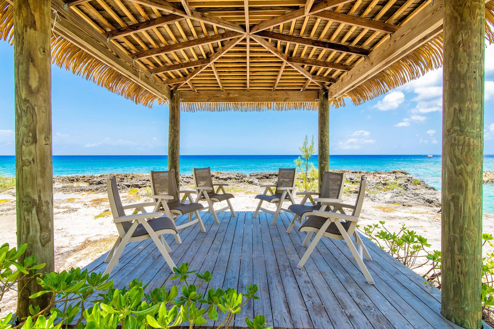 Slide under the beach cabana for amazing sunset viewings.