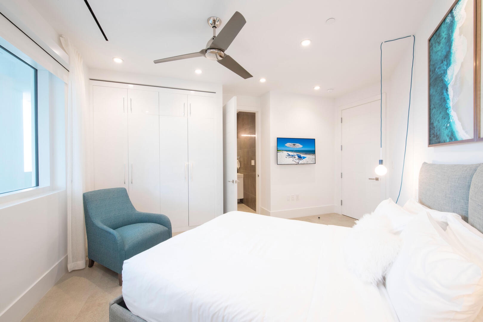 Guest Suite with SmartTV, ensuite bath with walk-in shower.