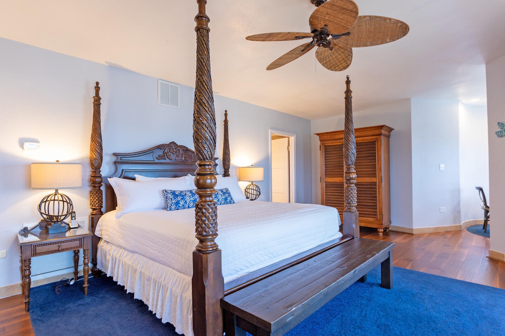 Four poster king bed in the master suite.