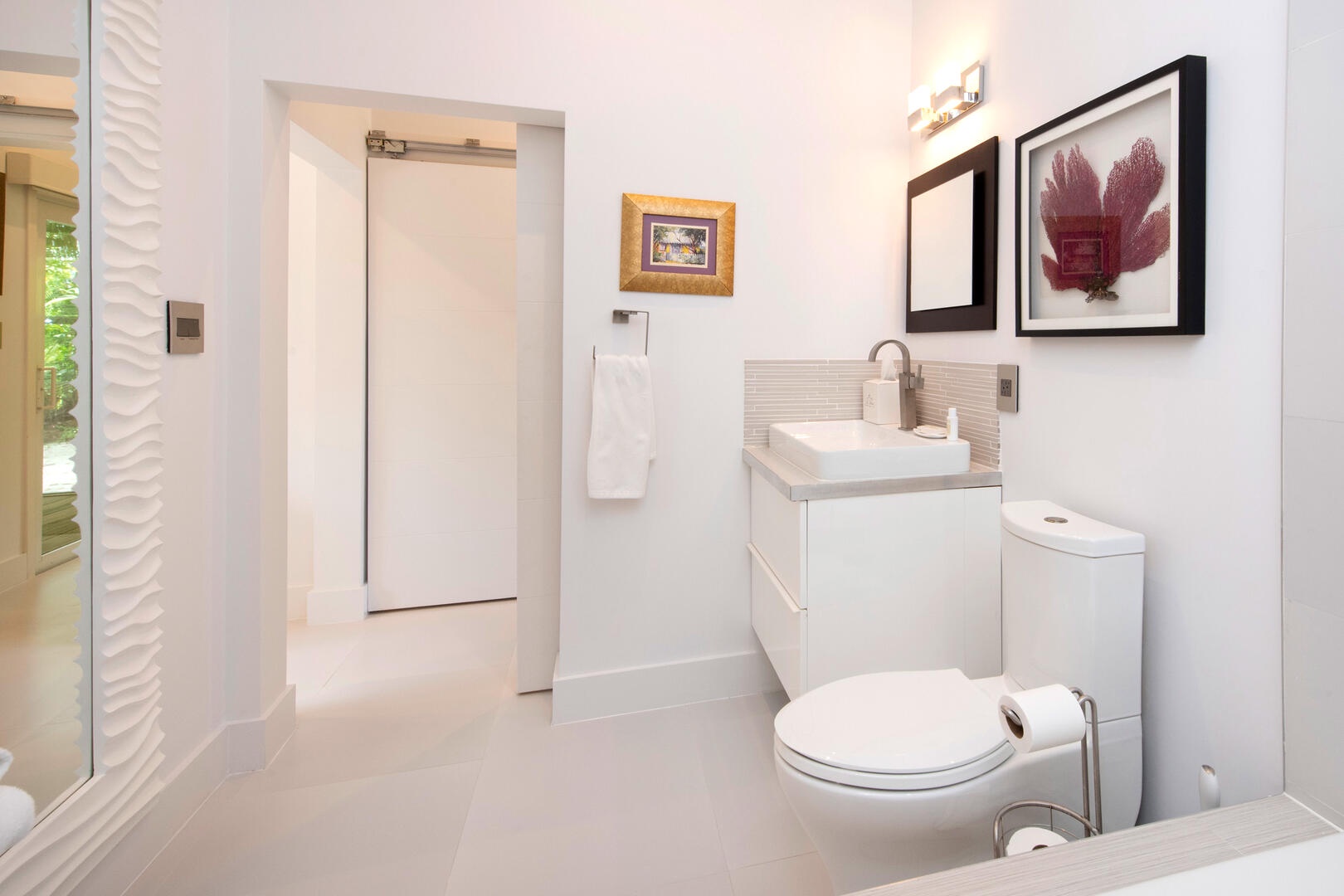 East Bedroom Bathroom with shower tub combo.