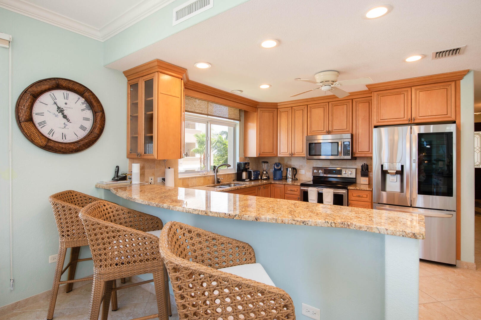 Full kitchen with modern appliances.