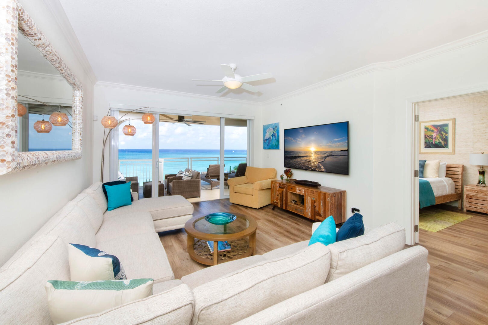 Refreshed living area with new furniture and decor.