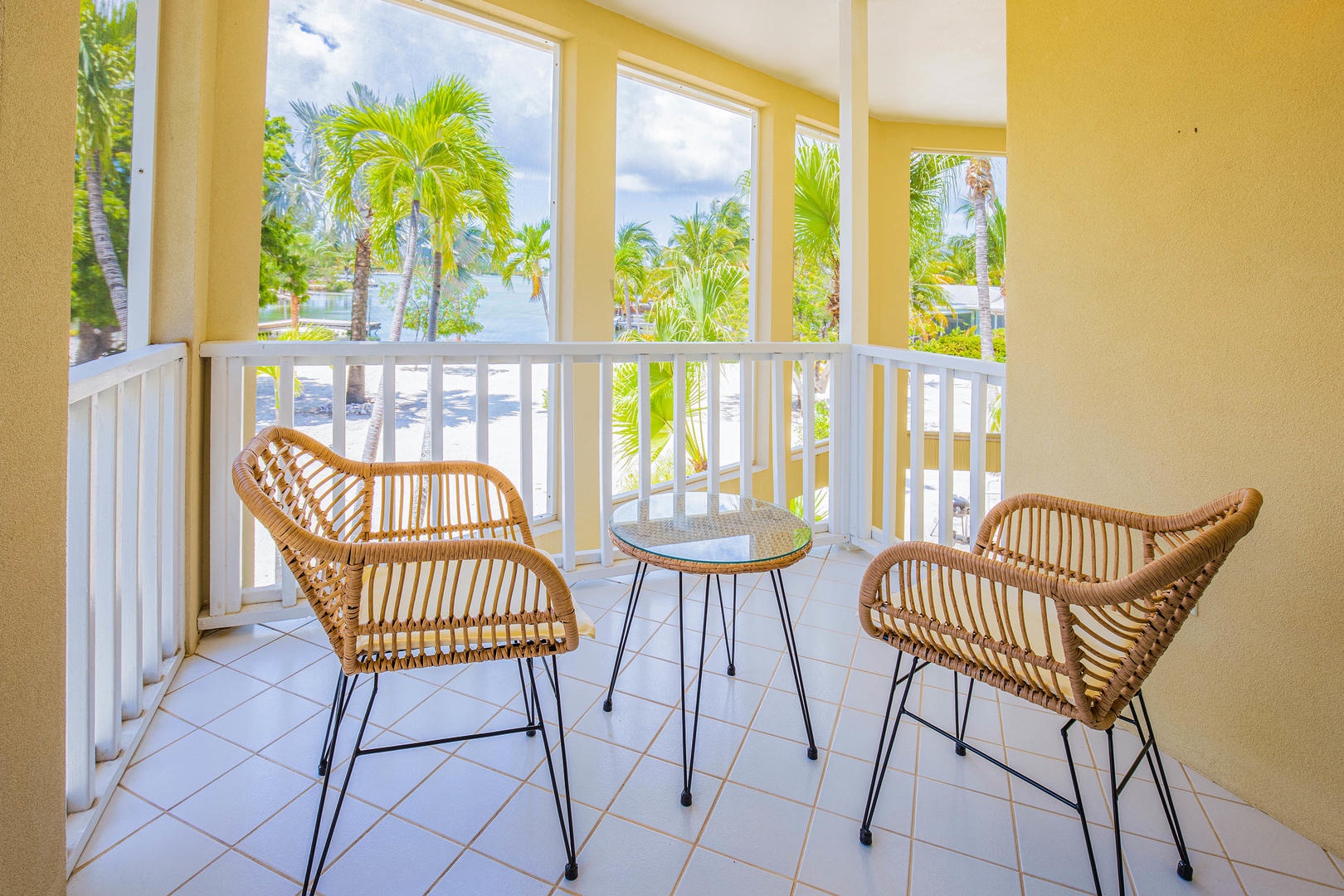 Small terrace off the master suite with tropical views.