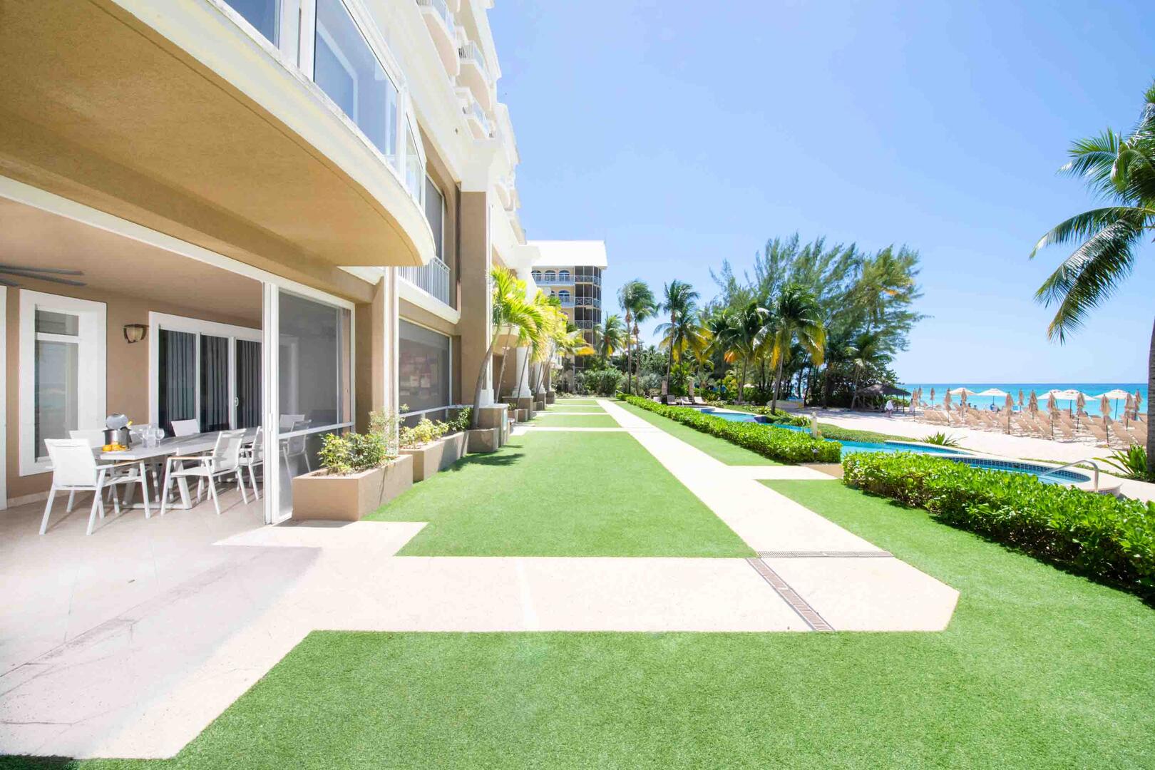 The resort's pool and heated spa are steps from this unit's patio.