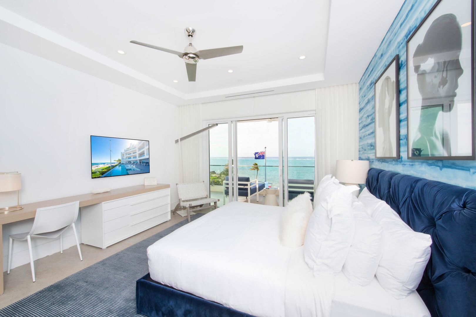 Primary Suite with king bed, SmartTV, and desk + chair. The resort is perfect for work from home professionals.