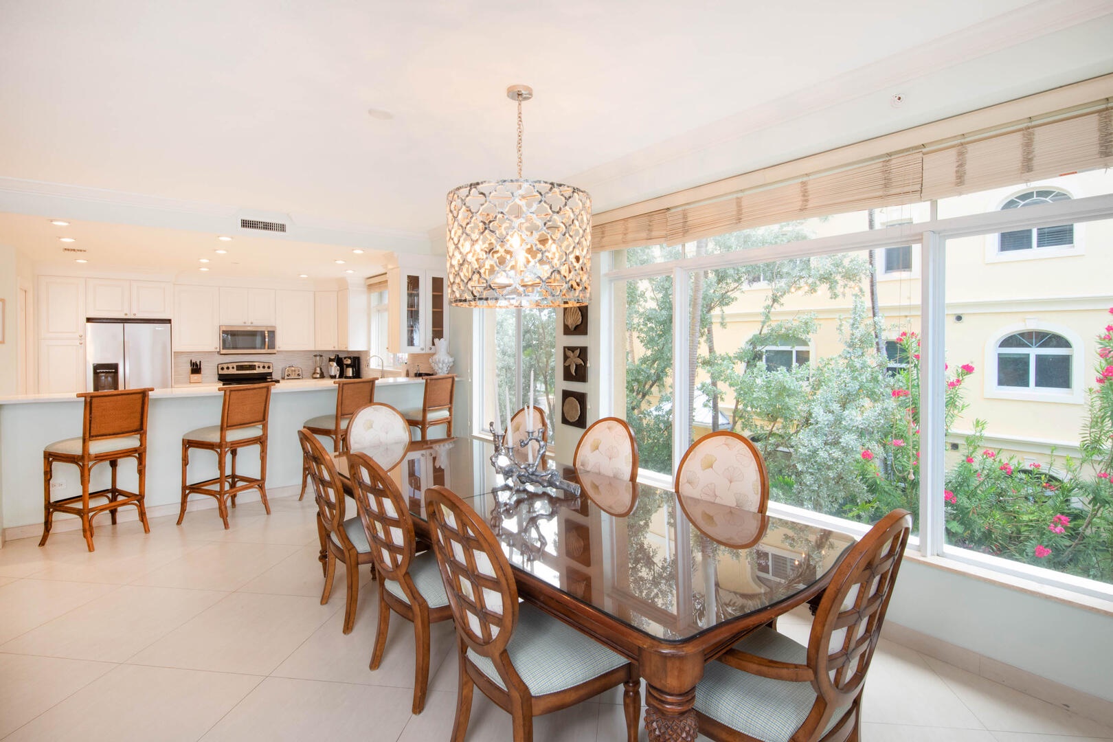 There's also a dining table on the balcony for meals with seaside views.