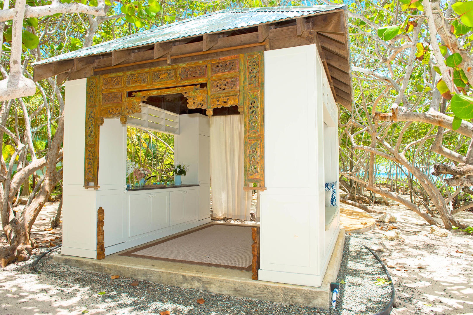 Beautiful inspiration cabana with a lounger that makes a perfect reading nook.