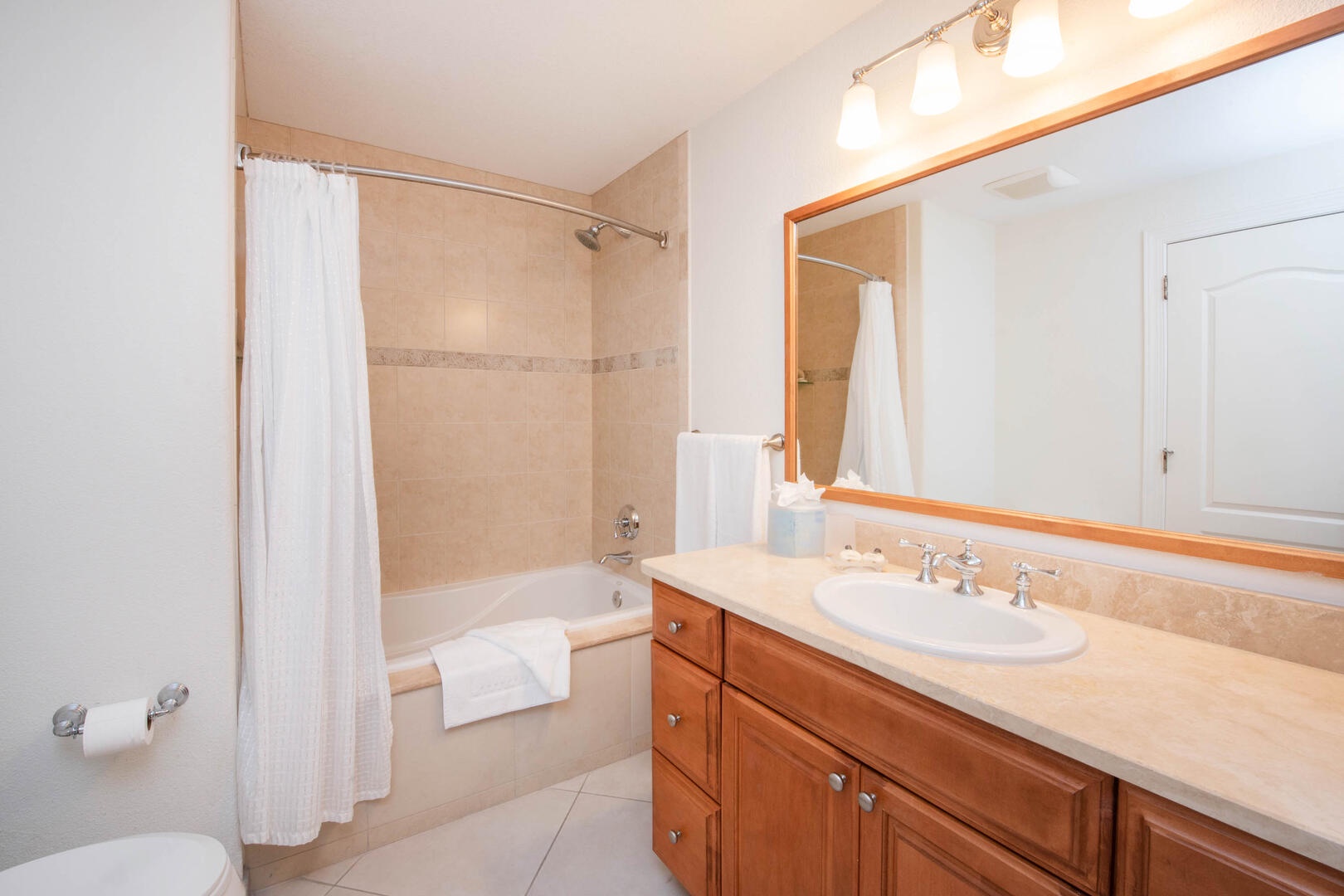 Bedroom 2 ensuite with shower bath.