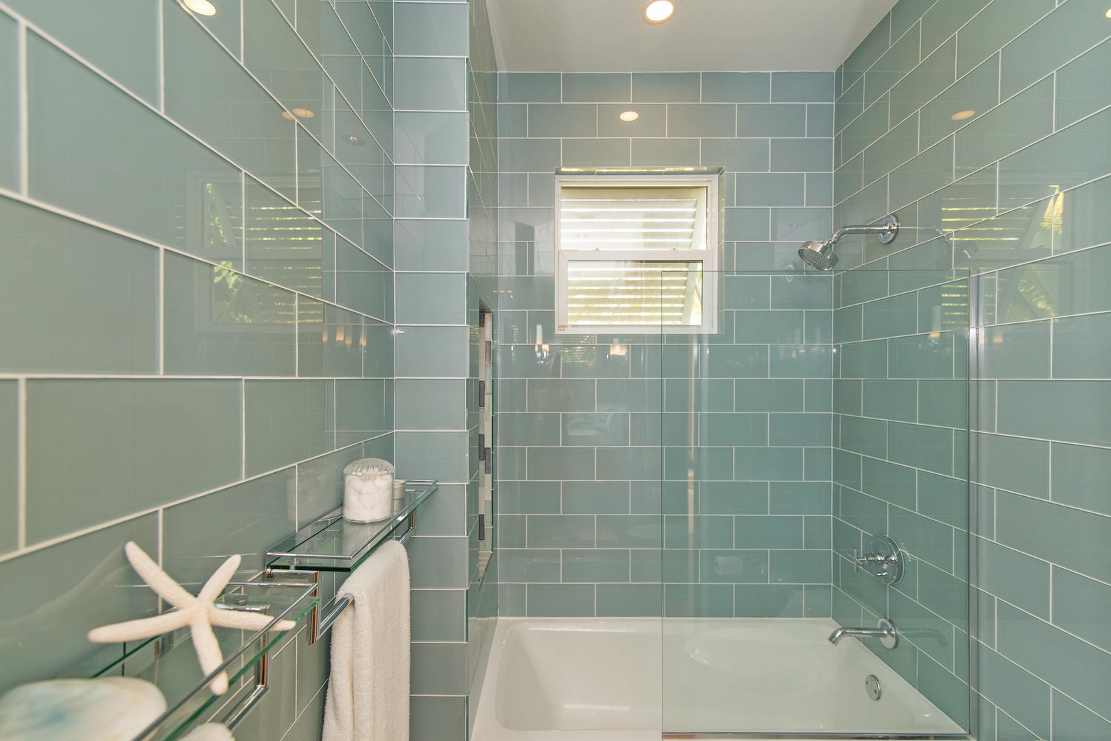 Twin Bathroom with a shower/tub combination.