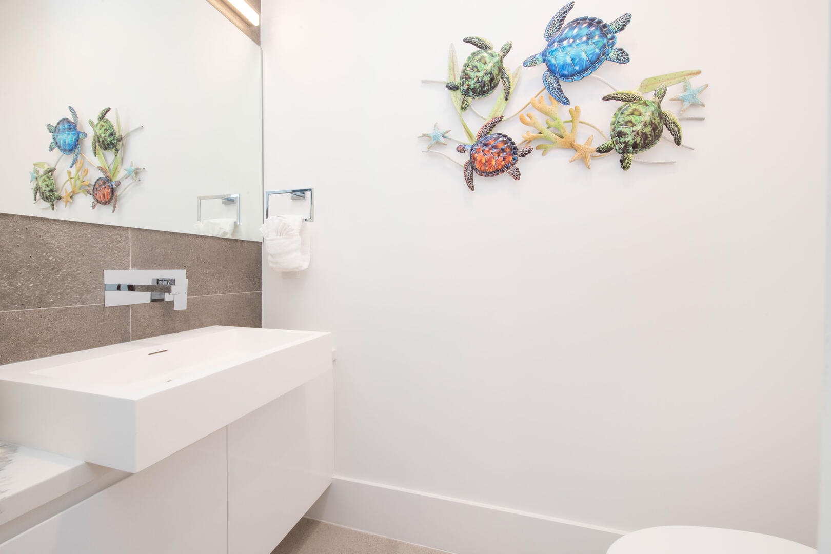 Powder Room off the foyer.