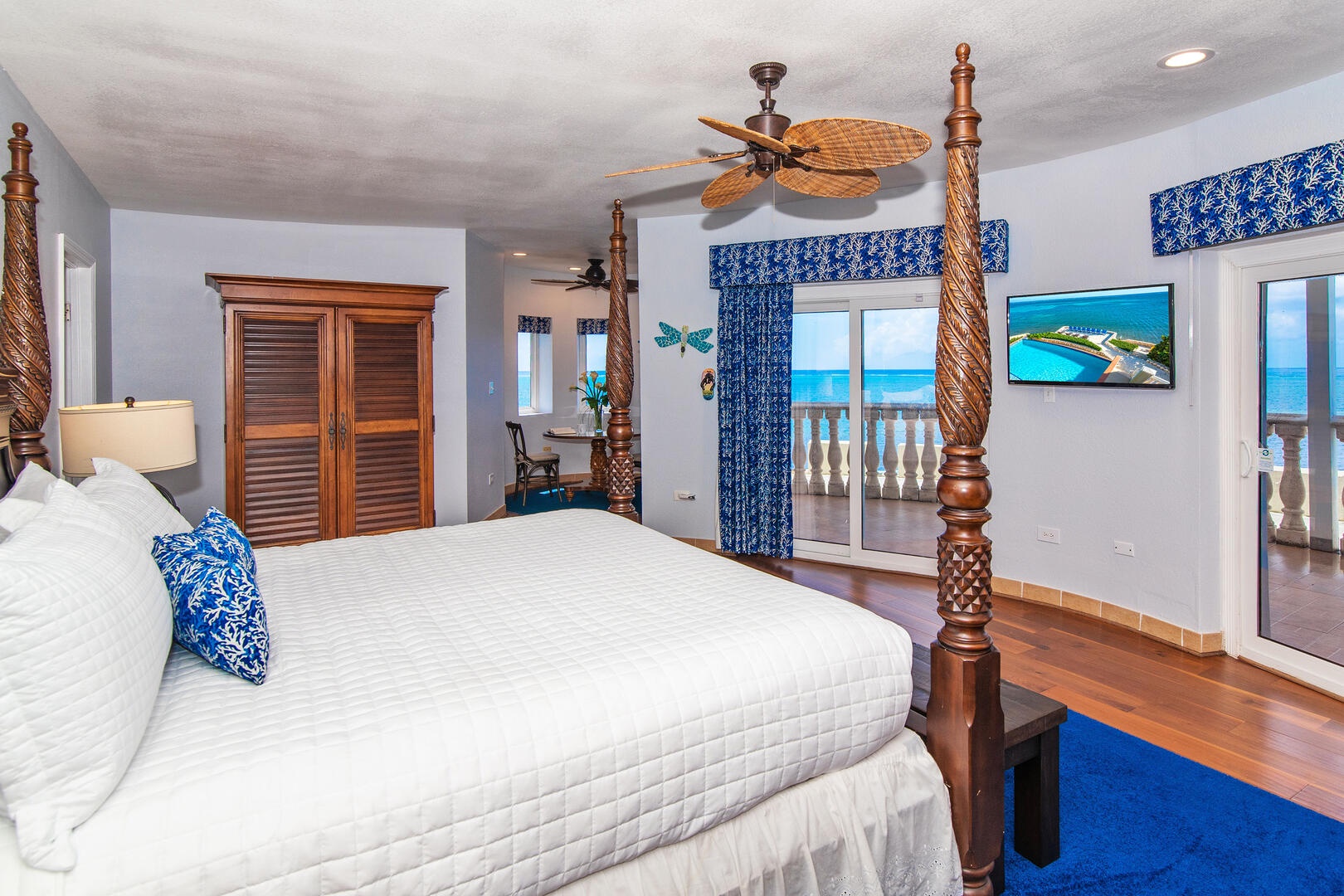 The master suite spans the entire upper floor and includes a king bed, ensuite bath, and walk-out sun terrace