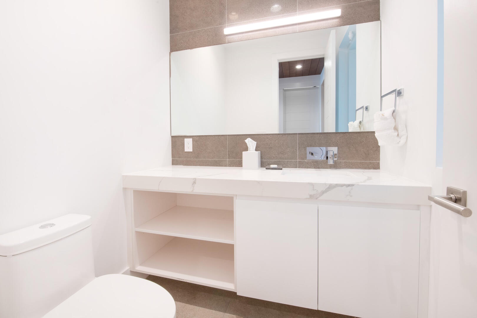 Powder Room off the foyer.