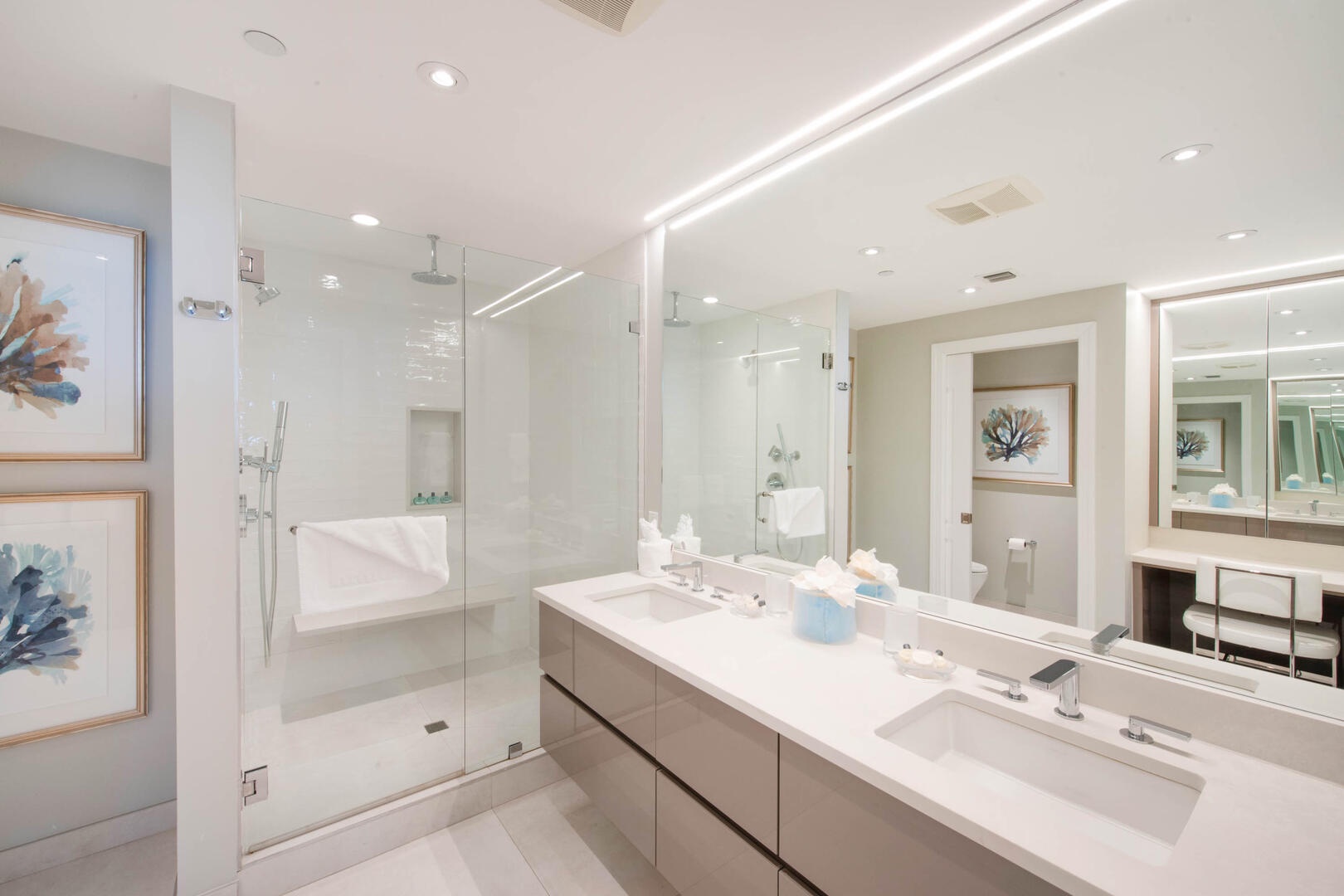 Master bathroom with glass shower.