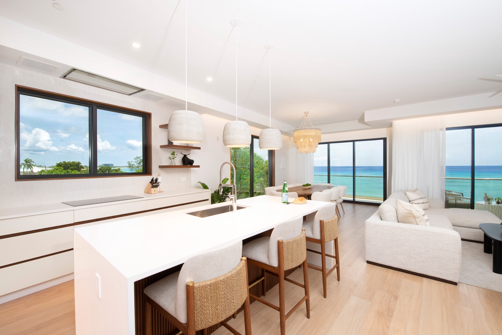 Modern kitchen with breakfast bar seating.